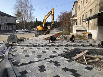 Быстро и без ущерба качеству: строительство поликлиники в Артёмовском завершено на две трети